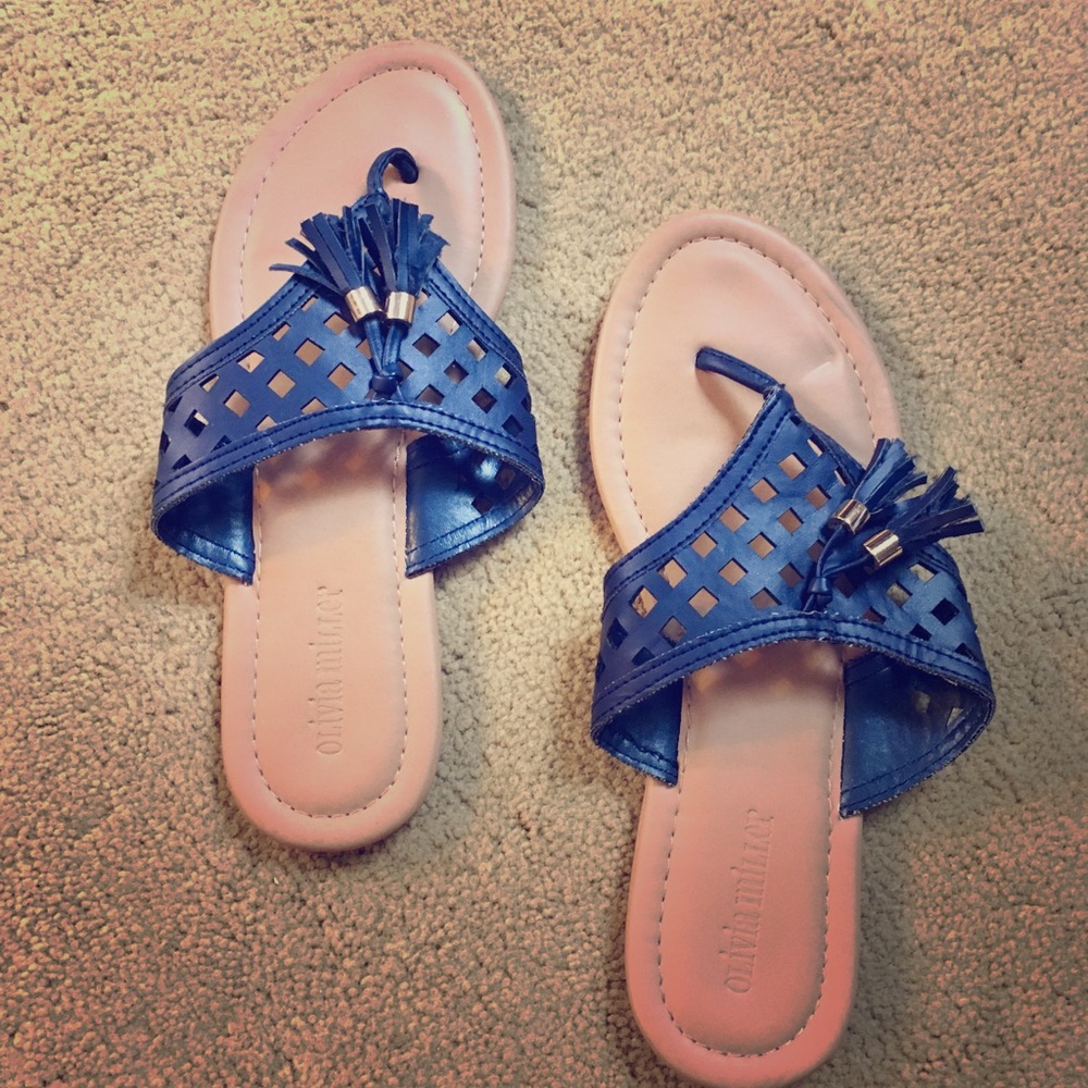 Olivia Miller tasseled flip flops